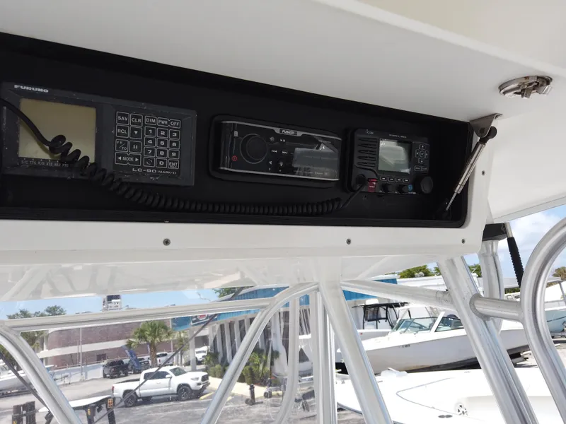 Slide: The Image of Control panel of a 2005 Regulator 32 Forward Seating boat. - 10