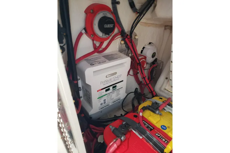 Slide: The Image of Electrical system of a 2005 Regulator 32 Forward Seating boat with ProNautic charger. - 36