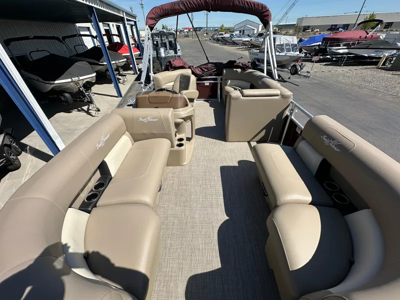 Slide: The Image of 2024 SunChaser Vista 18 LR pontoon boat with spacious seating and modern design. - 4