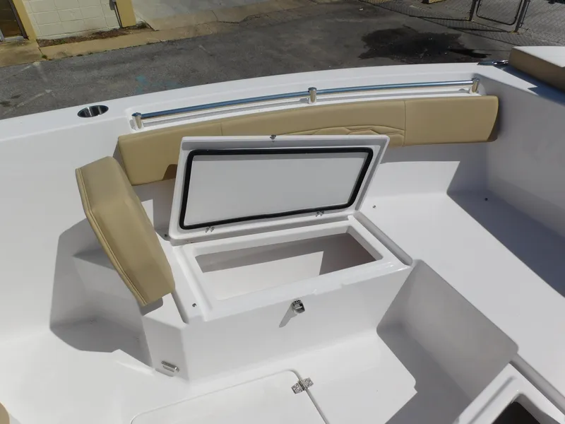 Slide: The Image of 2024 Aquasport 2200 Center Console boat with open storage compartment. - 14