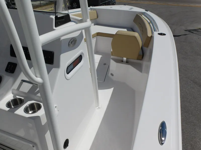 Slide: The Image of 2024 Aquasport 2200 Center Console boat interior with seating and console features. - 16