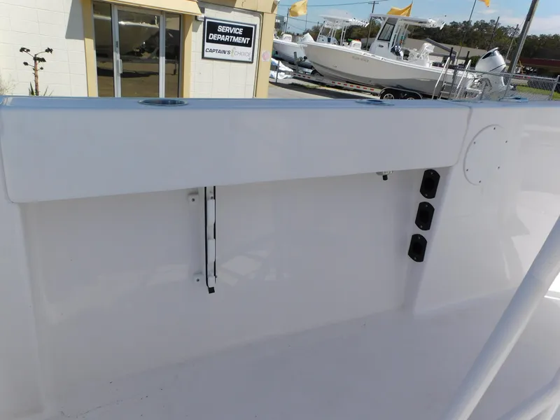 Slide: The Image of 2024 Aquasport 2200 Center Console boat interior near service department. - 34