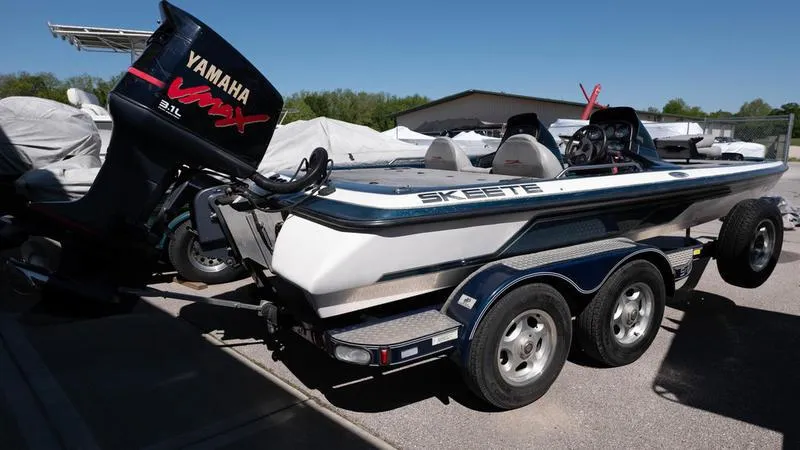 Slide: The Image of 2001 Skeeter ZX200 boat with Yamaha VMAX engine on trailer. - 16
