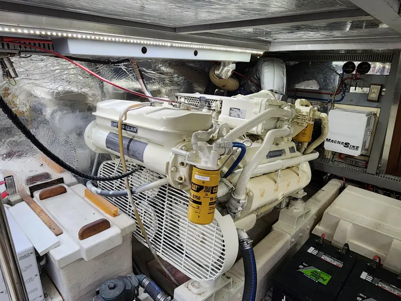 Slide: The Image of Engine room of a 1987 Hi-Star Yacht Fisher 55 with Caterpillar engine. - 47