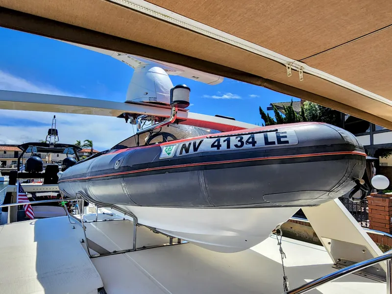 Slide: The Image of 1987 Hi-Star Yacht Fisher 55 with inflatable boat on deck. - 8