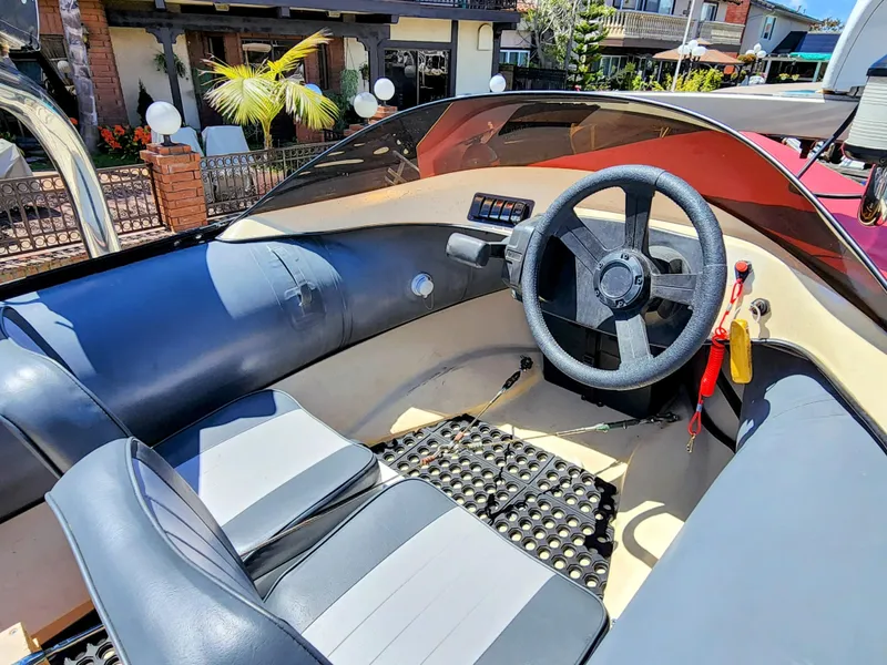 Slide: The Image of Interior cockpit of 1987 Hi-Star Yacht Fisher 55 with steering wheel and seating. - 9