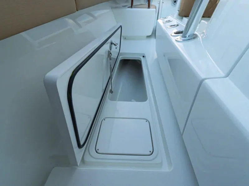 Slide: The Image of Valhalla Boatworks V-37 2025 model, open storage compartment on deck. - 33