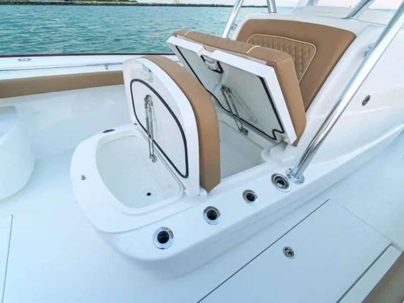 Slide: The Image of Valhalla Boatworks V-37 2025 model with open storage compartments on deck. - 38