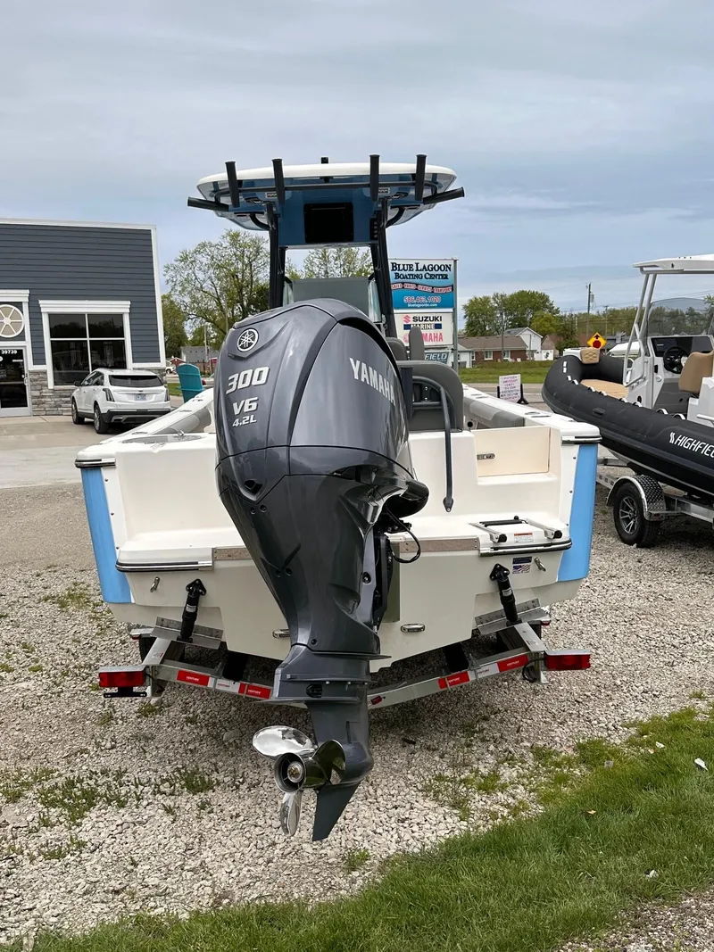Slide: The Image of 2024 Sea Born LX24 Center Console boat with Yamaha 300 V6 engine. - 2