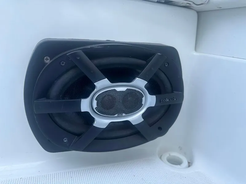 Slide: The Image of Close-up of a speaker on a 1999 Formula 330 SS boat. - 21