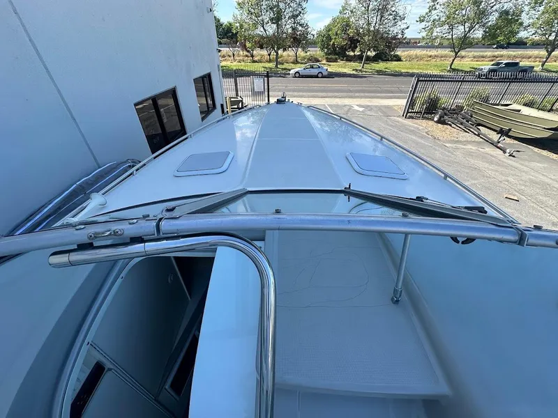 Slide: The Image of 1999 Formula 330 SS boat deck view with stainless steel railings. - 31