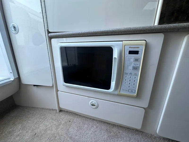 Slide: The Image of Built-in Panasonic microwave in 1999 Formula 330 SS boat kitchen. - 37