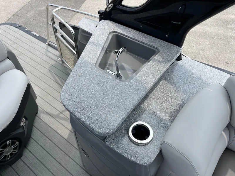 Slide: The Image of 2023 Avalon 2585 Excalibur LTD Tri Toon with sink and cup holder. - 11