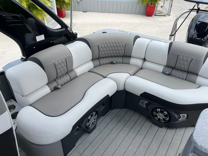 Slide: The Image of Luxurious seating area of 2023 Avalon 2585 Excalibur LTD Tri Toon boat with high-performance Mercury Racing 400R. - 12