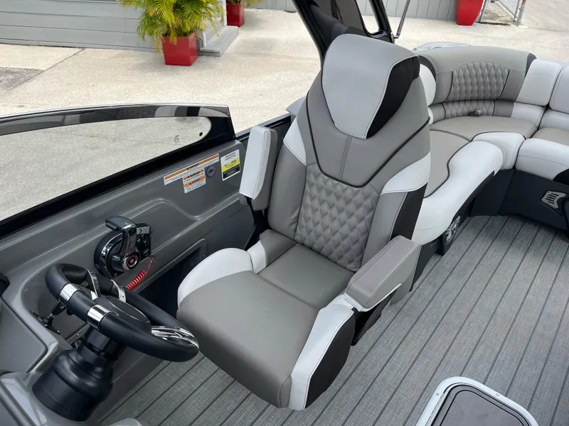 Slide: The Image of 2023 Avalon 2585 Excalibur LTD Tri Toon with Mercury Racing 400R, luxury captain's chair. - 14