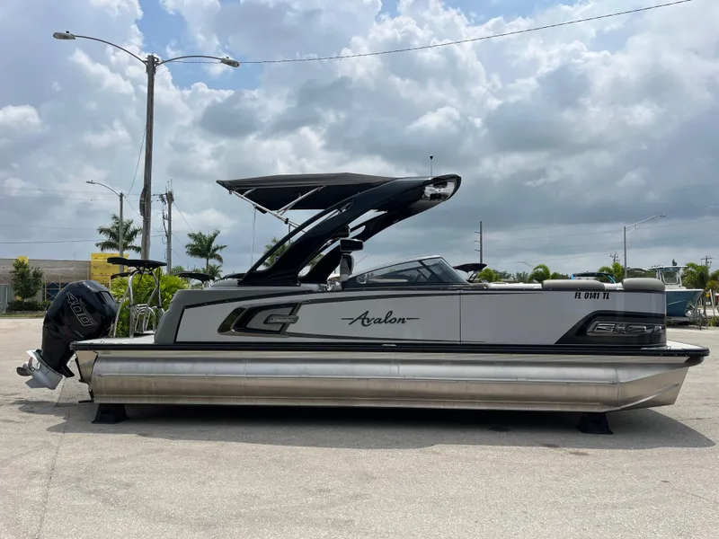 Slide: The Image of 2023 Avalon 2585 Excalibur LTD Tri Toon with Mercury Racing 400R, high performance pontoon boat. - 3