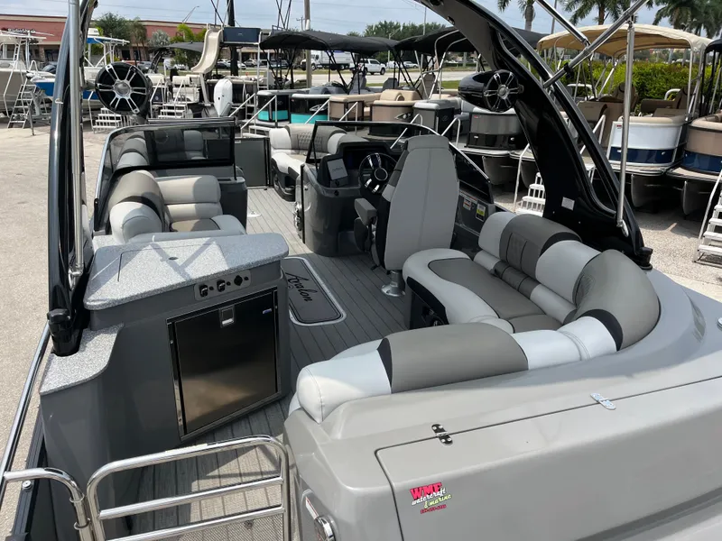 Slide: The Image of 2023 Avalon 2585 Excalibur LTD Tri Toon with Mercury Racing 400R, luxury interior. - 8