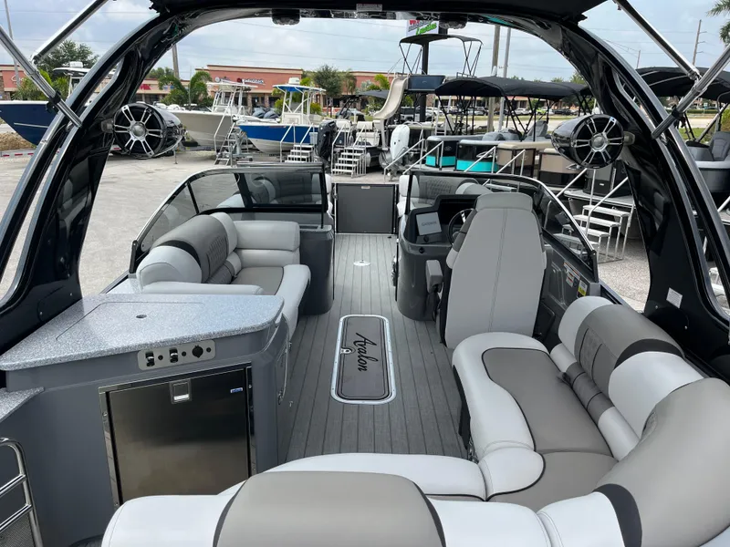Slide: The Image of 2023 Avalon 2585 Excalibur LTD Tri Toon with Mercury Racing 400R, luxury interior. - 9