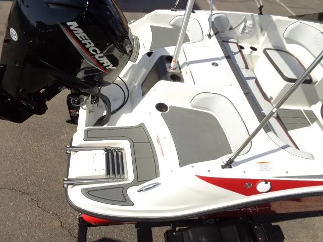 Slide: The Image of 2023 Bayliner Element M17 boat with Mercury engine, rear deck view. - 4