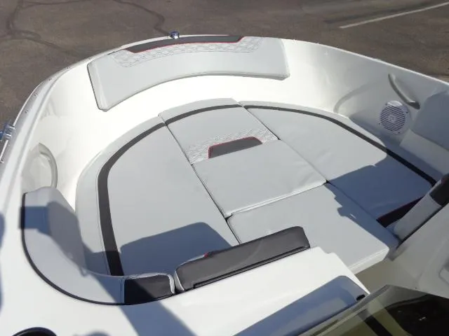 Slide: The Image of 2023 Bayliner Element M17 boat interior with cushioned seating. - 6