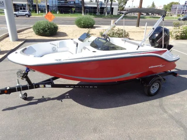Slide: The Image of 2023 Bayliner Element M17 boat in red on a trailer. - 9