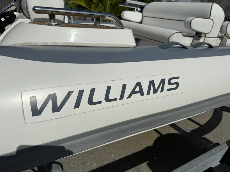 Slide: The Image of 2019 Williams Jet Tenders 445 inflatable boat, close-up view of branding. - 5