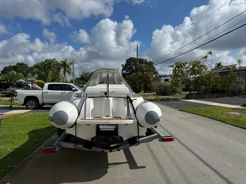Slide: The Image of 2019 Williams Jet Tenders 445 on trailer in residential area. - 9
