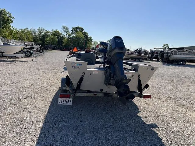 Slide: The Image of 2009 G3 Eagle 176 boat with outboard motor in a boatyard. - 6