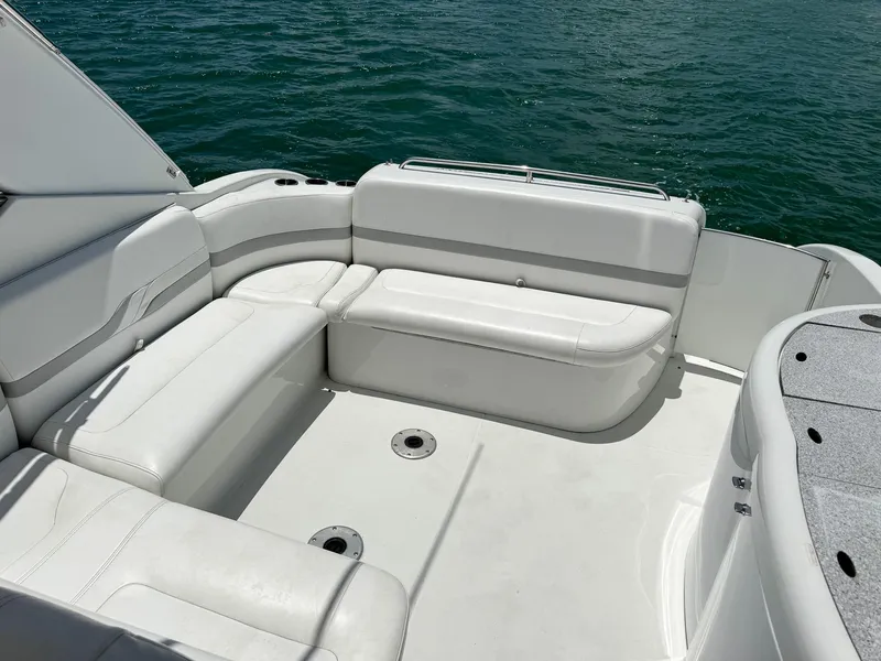 Slide: The Image of Interior of a 2005 Formula 370 Super Sport yacht with white seating. - 11