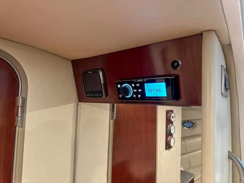 Slide: The Image of Interior of 2005 Formula 370 Super Sport with radio and wood paneling. - 12