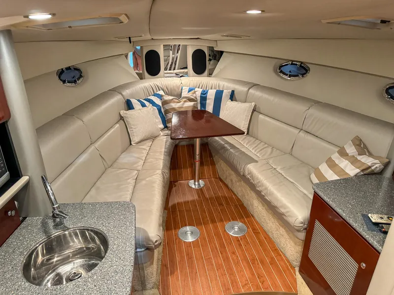 Slide: The Image of Interior of a 2005 Formula 370 Super Sport yacht with leather seating. - 14