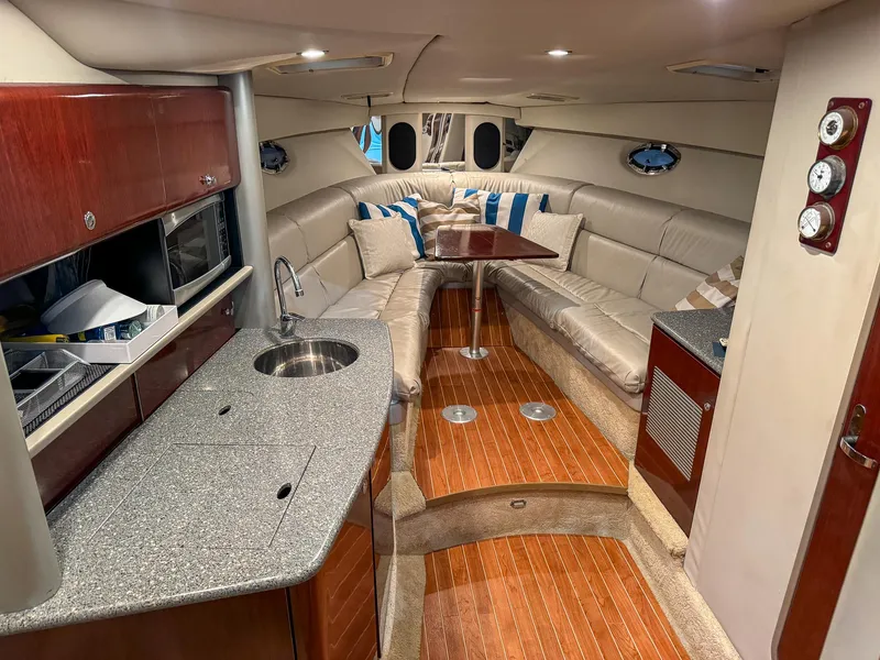 Slide: The Image of Interior of a 2005 Formula 370 Super Sport yacht with elegant furnishings. - 15