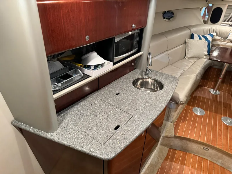 Slide: The Image of Interior of a 2005 Formula 370 Super Sport yacht with kitchenette. - 16