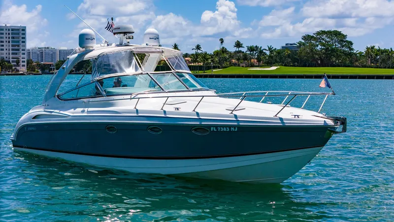 Slide: The Image of 2005 Formula 370 Super Sport yacht on blue water. - 2