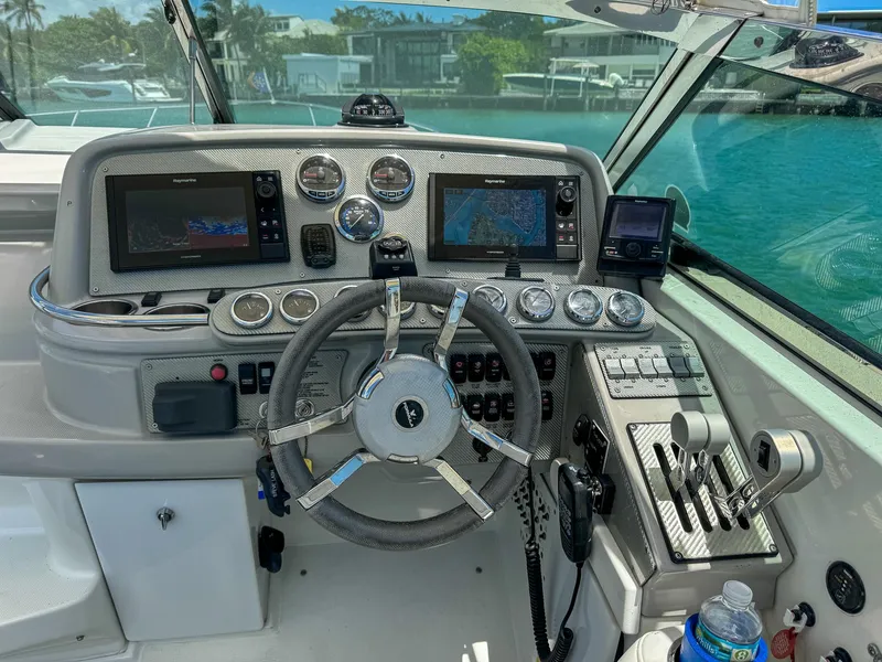 Slide: The Image of Cockpit of a 2005 Formula 370 Super Sport boat with controls and instruments. - 4