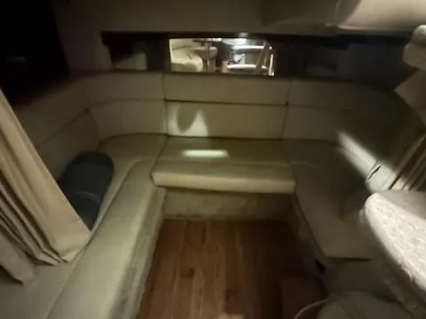 Slide: The Image of Interior seating area of 2005 Sea Ray 320 Sundancer yacht. - 11
