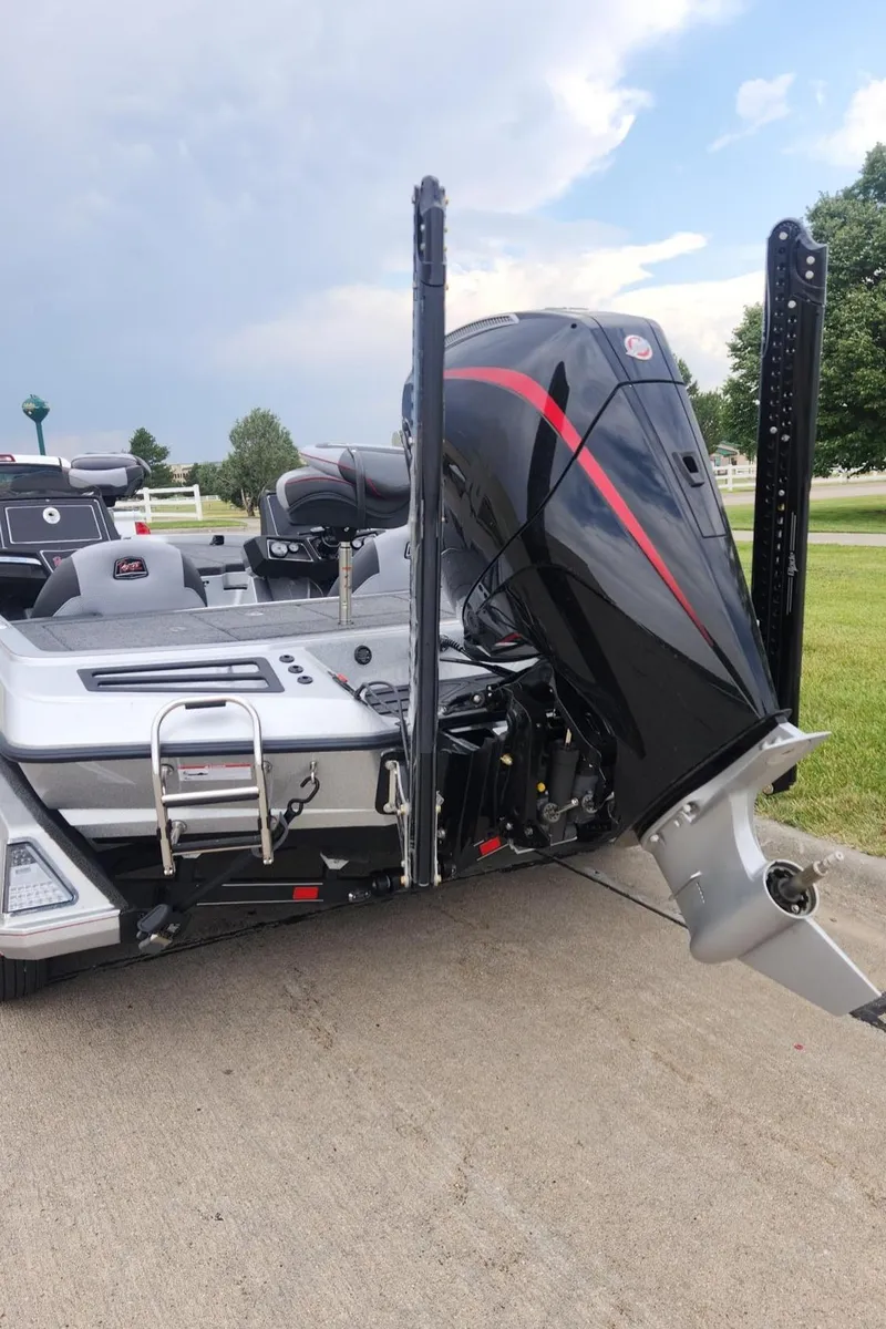 Slide: The Image of 2024 Ranger Z519 Garmin Ranger Cup Equipped boat rear view with outboard motor. - 11