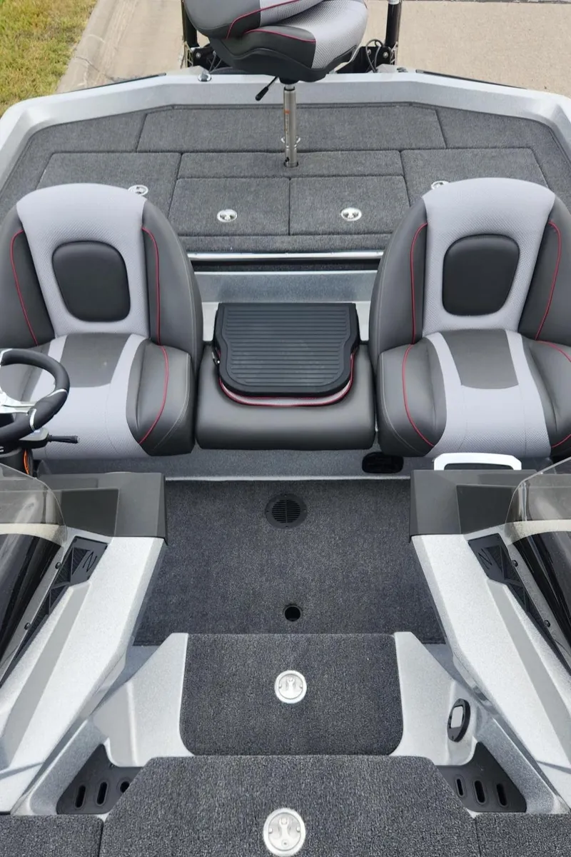 Slide: The Image of 2024 Ranger Z519 Garmin Ranger Cup Equipped boat interior with dual seats and steering console. - 8
