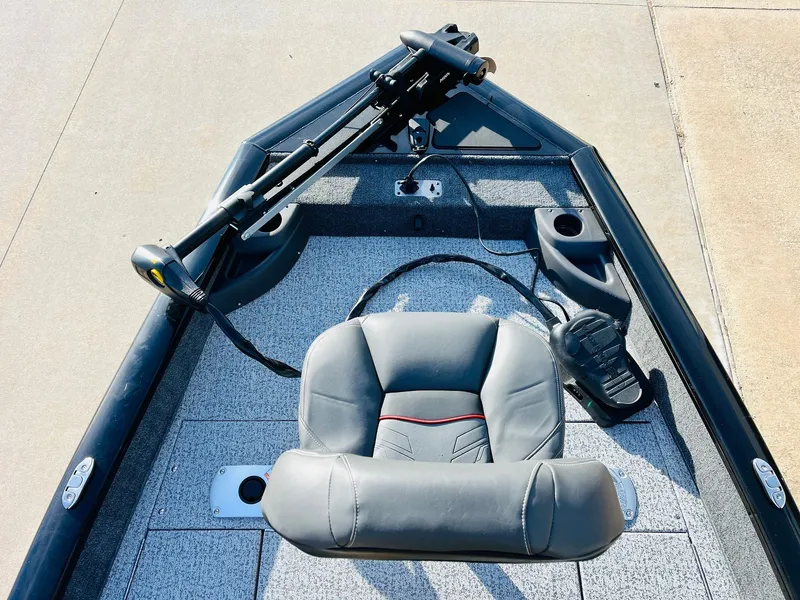 Slide: The Image of 2024 Tracker Pro Team 175 TF fishing boat bow with seat and trolling motor. - 10