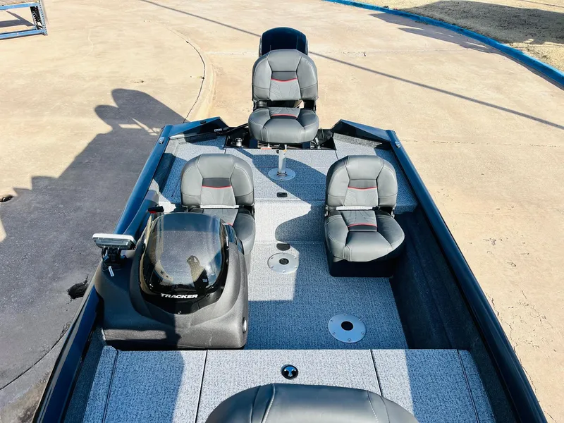 Slide: The Image of 2024 Tracker Pro Team 175 TF fishing boat with seating and console. - 17