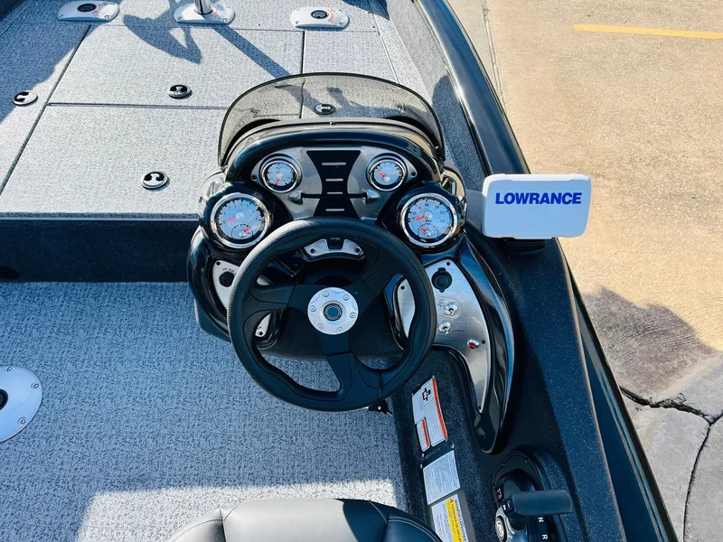 Slide: The Image of 2024 Tracker Pro Team 175 TF boat dashboard with Lowrance fishfinder. - 20