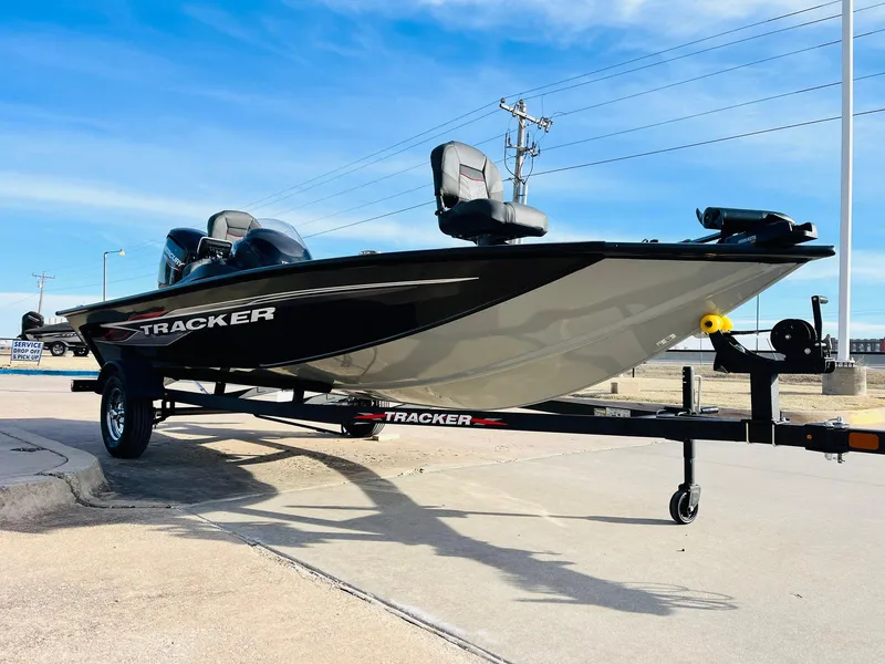 Slide: The Image of 2024 Tracker Pro Team 175 TF fishing boat on trailer, black and white. - 3