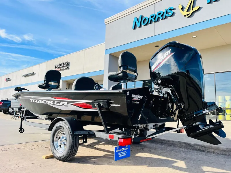 Slide: The Image of 2024 Tracker Pro Team 175 TF boat on display at Norris Marine dealership. - 7