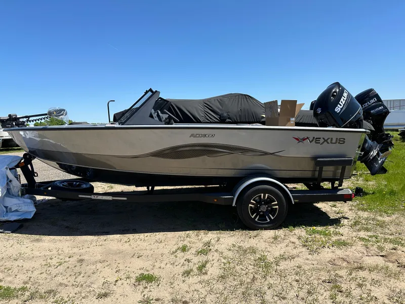 The Image of 2024 Vexus ADX180 boat on trailer with Suzuki outboard motor. - 0