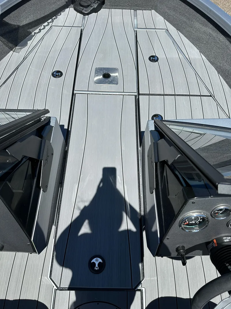 Slide: The Image of 2024 Vexus ADX180 boat deck with sleek, modern design and advanced instrumentation. - 10