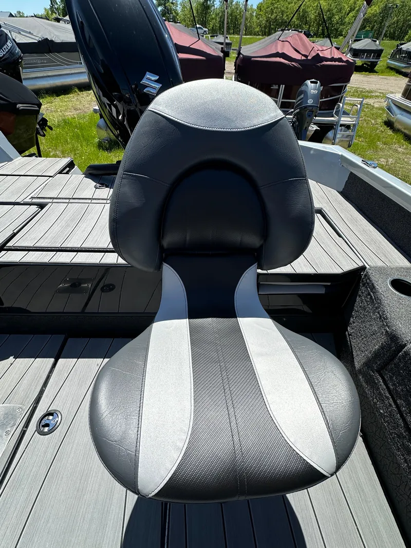 Slide: The Image of 2024 Vexus ADX180 boat seat with black and white upholstery. - 25