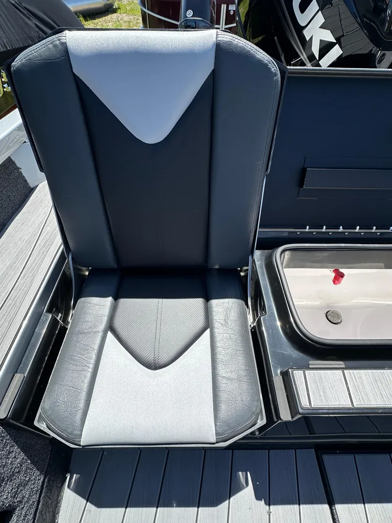 Slide: The Image of 2024 Vexus ADX180 boat seat with storage compartment. - 26
