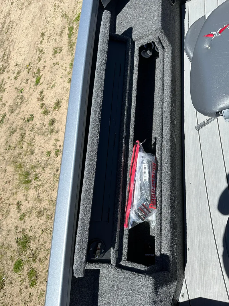 Slide: The Image of 2024 Vexus ADX180 boat storage compartment with accessories. - 27