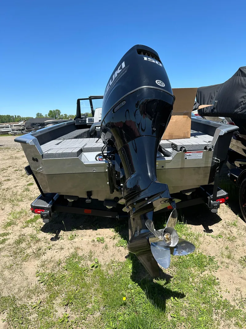 Slide: The Image of 2024 Vexus ADX180 boat with Suzuki outboard motor, rear view. - 30