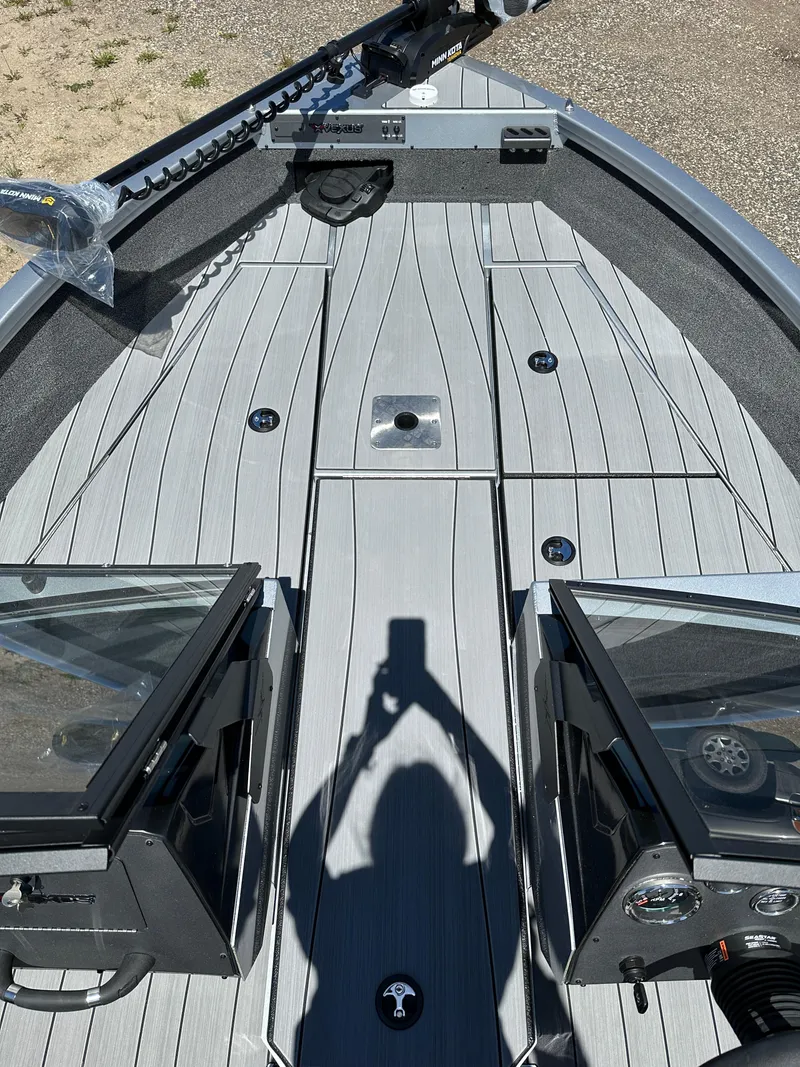 Slide: The Image of 2024 Vexus ADX180 boat deck with modern design and dual consoles. - 6